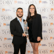 Bridge Industrial’s Carlos Rodriguez, Marlene Alonso with Bridge Point Commerce Center’s TOBY award 800x400