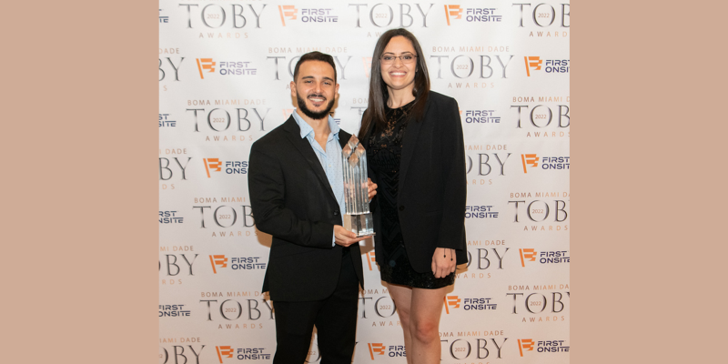 Bridge Industrial’s Carlos Rodriguez, Marlene Alonso with Bridge Point Commerce Center’s TOBY award 800x400